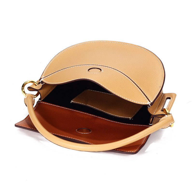 Saddle bag handbags